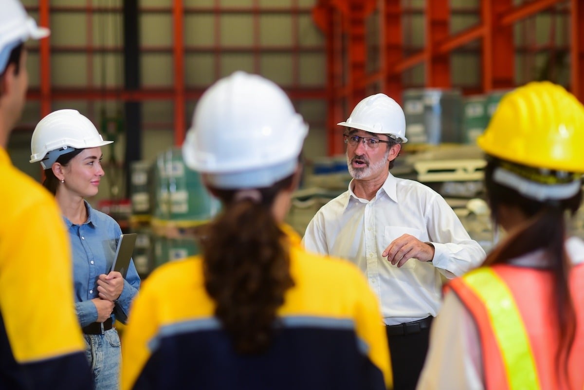 a team discussing lean manufacturing principles