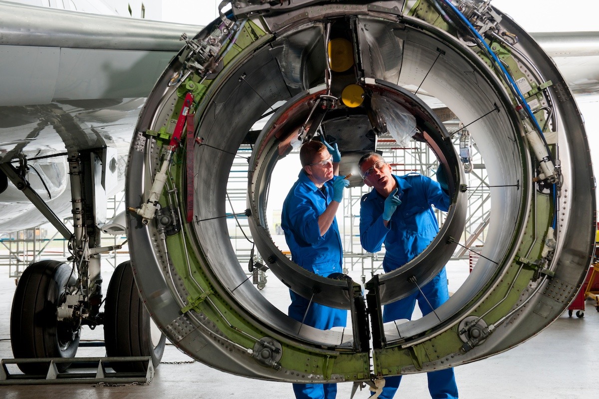 engineers in a manufacturing facility that's taken on a model based enterprise approach